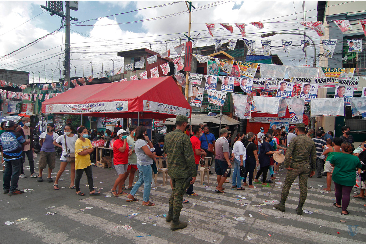 Army personnel deployed to help secure polling precincts on Election Day at the North Bay Boulevard Elementary School South, along Radial Road 10 in Navotas. Photo by Vincent Go.