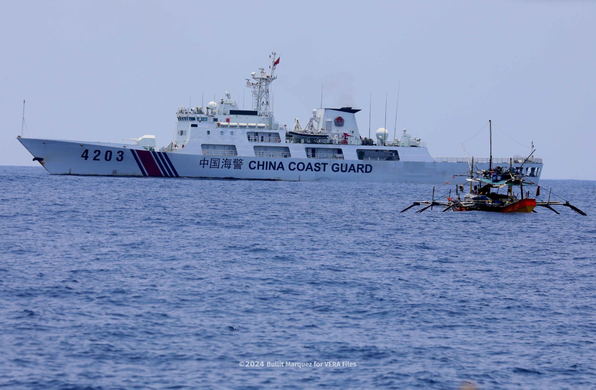 Atin Ito convoy reaches fishermen near Bajo de Masinloc under watchful eye of China’s Coast Guard. 4/11 Photo by Bullit Marquez