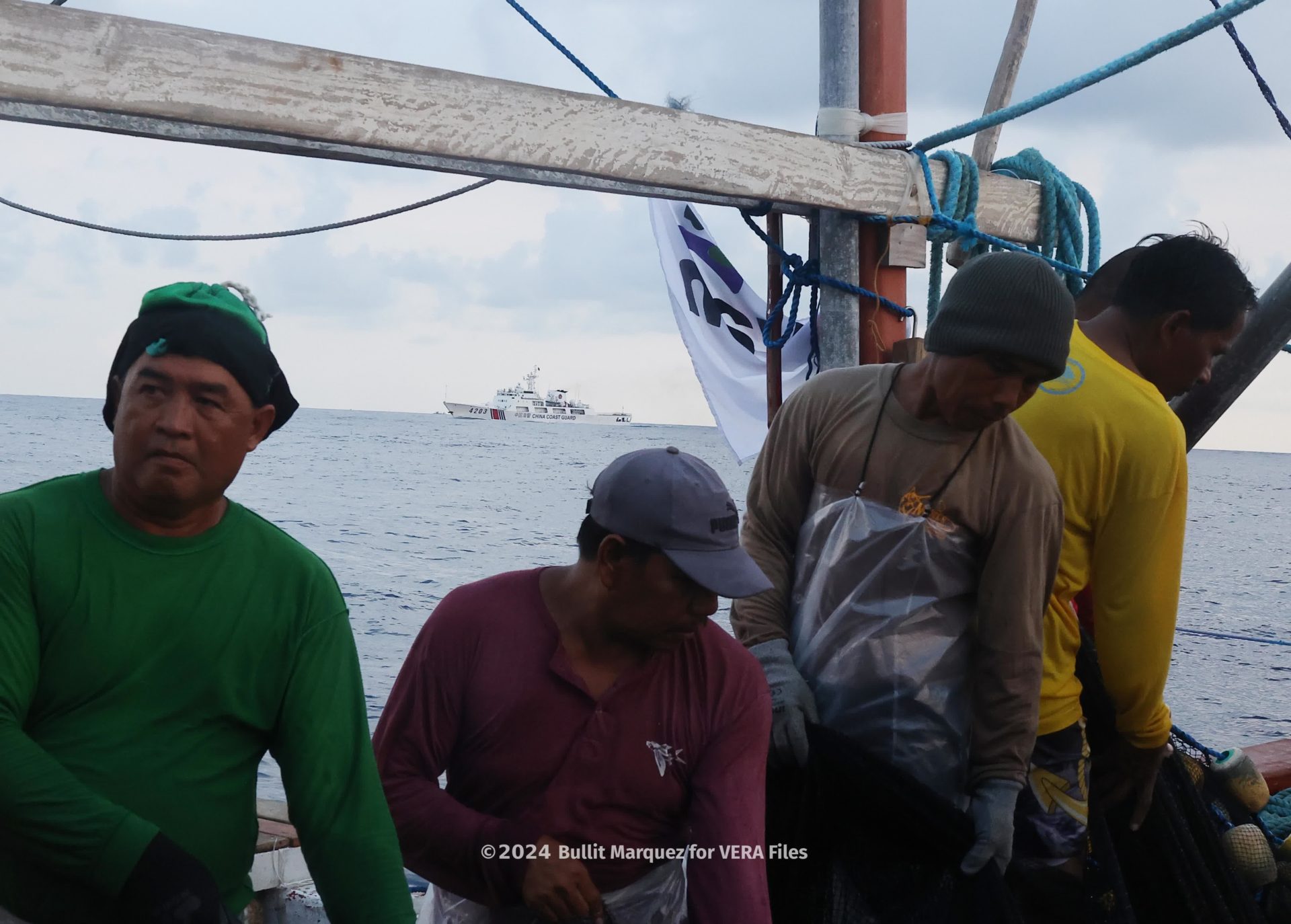 Atin Ito convoy reaches fishermen near Bajo de Masinloc under watchful eye of China’s Coast Guard. 7/11 Photo by Bullit Marquez