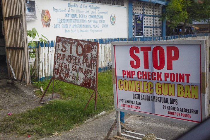 A sign announces the Comelec Gun Ban at a PNP Checkpoint in Datu Saudi Ampatuan, Maguindanao. The ban is in force from July 1 to July 31, 2012.  Photo by AMIEL MARK CAGAYAN.