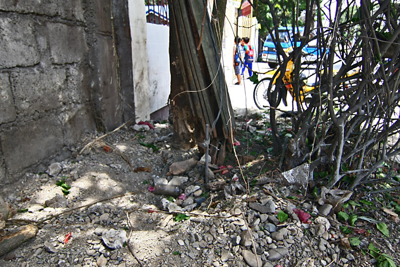 The site of the second IED explosion in front of a mosque. Photo by VINCENT GO. 