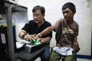 A person with disability (PWD) updates his voter’s information at a special registration in San Mateo, Rizal. Photo by MARIO IGNACIO IV 