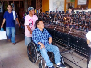 Arleigh Sitoy visits Simala church located in a mountainous area in Sibonga, Cebu to offer a prayer two days before the May 13 elections. Photo by MYLENE LISONDRA