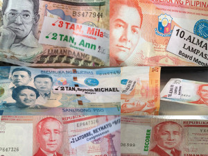 Campaigning Samar style:  Candidates' names are pasted to peso bills