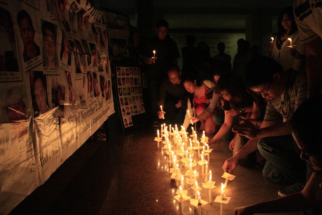 Families of Maguindanao massacre victims, together with students and journalists, light candles to commemorate the 44th month since the tragedy happened. Photo by RICHEL UMEL, NUJP