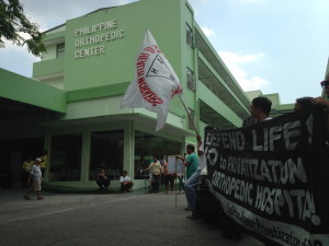 Health workers at the Philippine Orthopedic Center protest its privatization. Photo by PATRICIA ISABEL GLORIA