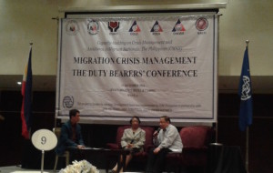 Labor Secretary Rosalinda Baldoz and DFA Senior Special Assistant Renato Villa during the IOM Migration Crisis Management conference.