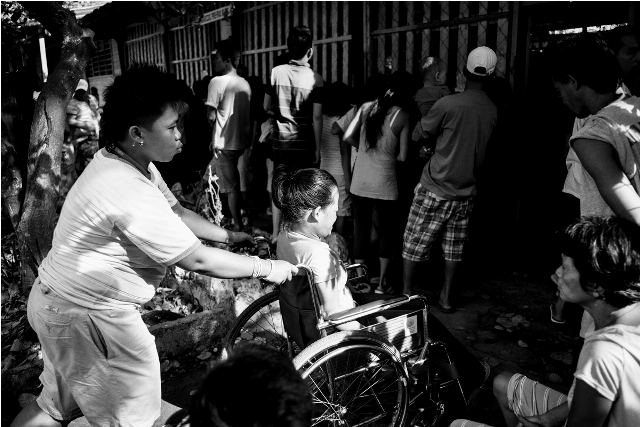 Cramped spaces, unpaved roads bar PWDs  from easy access to voting centers on election day. (File photo by Mario Ignacio IV)