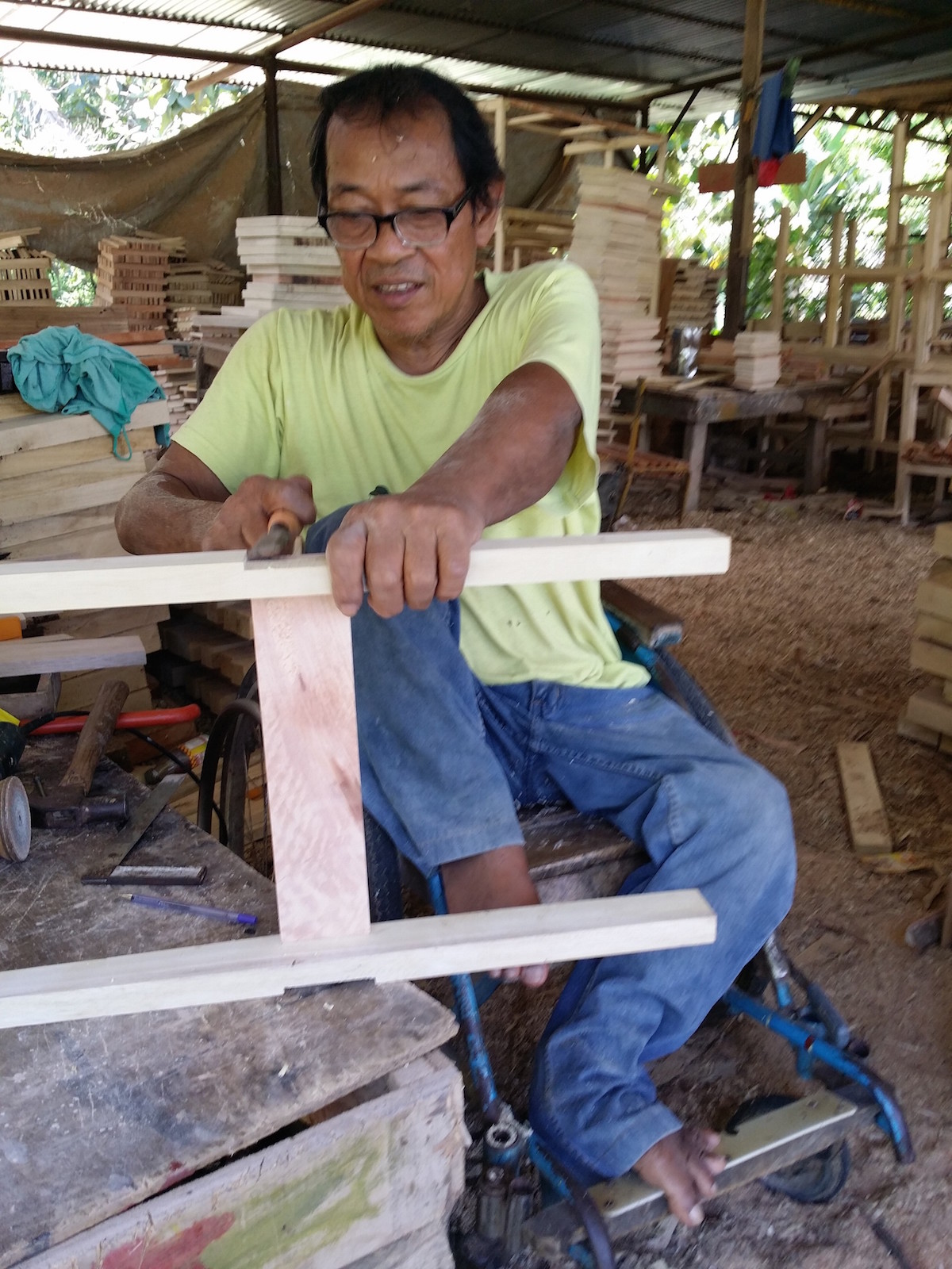 Wheelchair user Sofronio Floro is one of the homeowners in Davao City’s ADAP Village, a community of PWDs that provides livelihood opportunities for members through cooperativism. Photo by JOHN FRANCES C. FUENTES