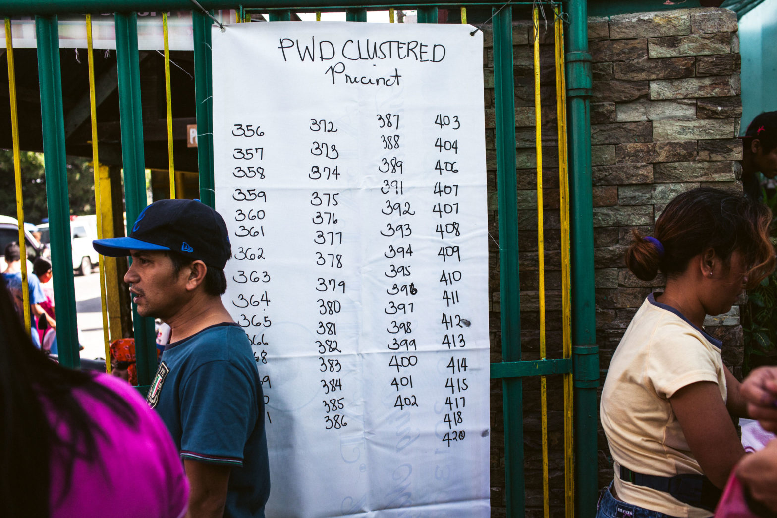 A sign of PWD clustered precincts at the entrance of Salawag Elementary School in Cavite in the 2013 elections.