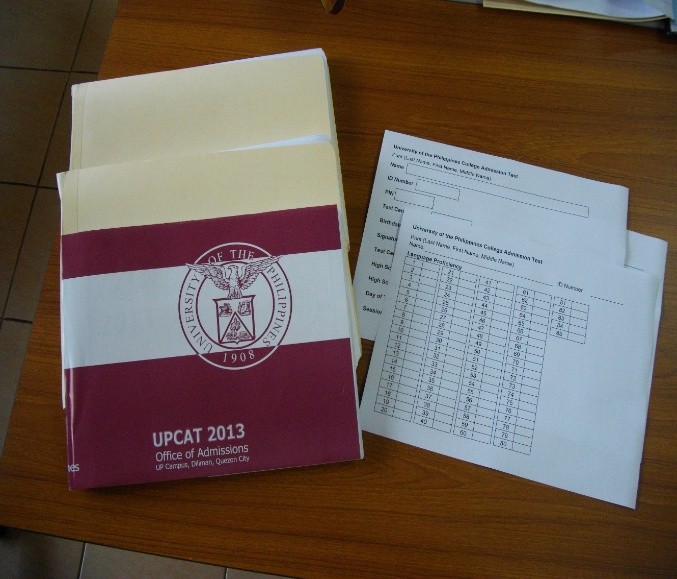 Large-print UPCAT booklets for students with visual disability (Photo courtesy of Diane Catibog of UP Office of Admissions)
