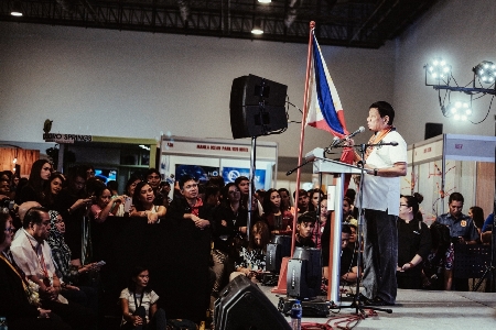 Presidential Candidate Rodrigo Duterte holds the flag