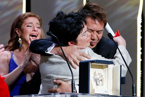 2016 Cannes Film Festival Best Actress  Jaclyn Jose hugs Director Brillante Mendoza upon receiving award. Daughte Andi Eigenmann looks on