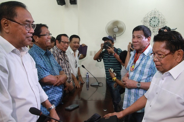 Ghazali Jaafar, 1st Vice Chair of the Moro Islamic Liberation Front (right) introduces the other members of the MILF Central Committee to presidential candidate and Davao City mayor Rodrigo Duterte during his visit in Camp Darapanan, Sultan Kudarat town in Maguindanao on February 27, 2016. MindaNews photo by TOTO LOZANO
