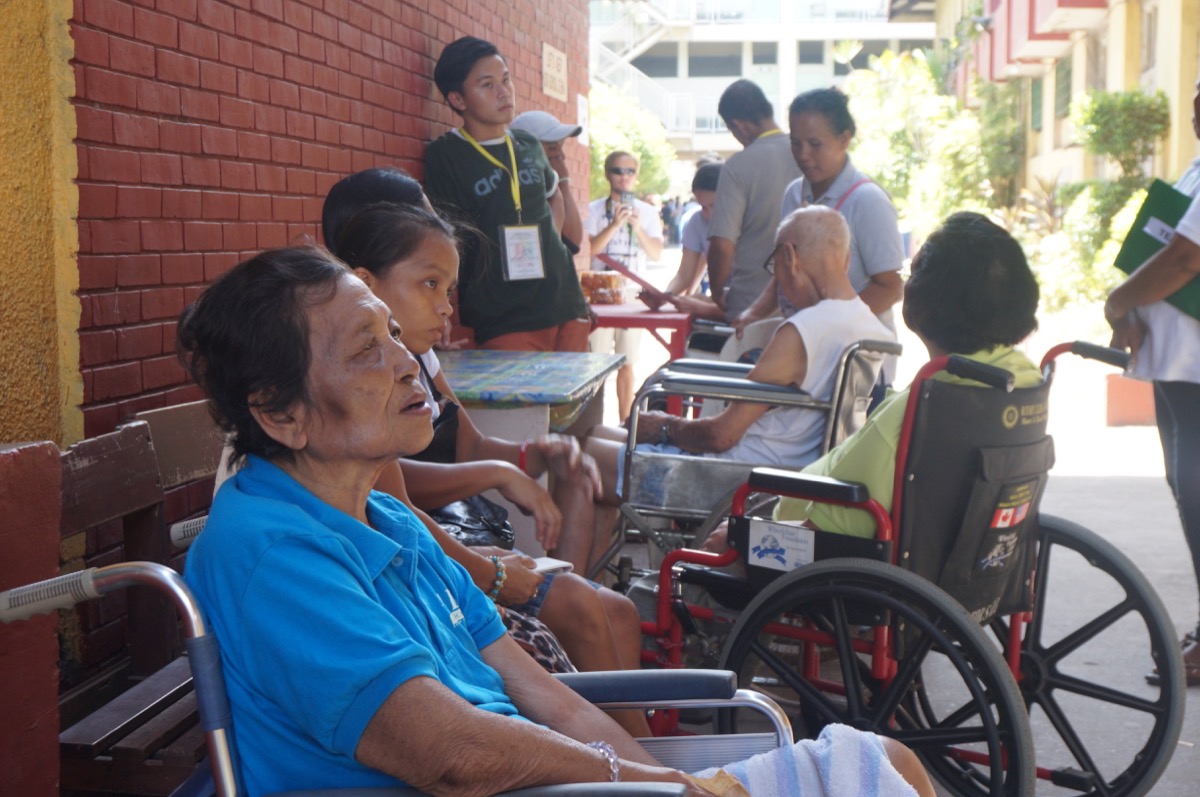 PWDs wait to vote at a corridor in Abellana National School in Cebu City. This is one of two EAPPs in the school during the May 9 elections. File photo by LUCILLE SODIPE