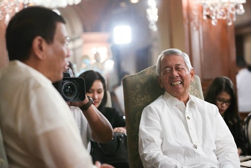 Not fired but he will exit. Foreign Affairs Secretary Perfecto Yasay Jr. shares a light moment with President Rodrigo R. Duterte during a meeting at the Music Room in Malacañan Palace on July 19.Photo by King Rodriguez/PPD