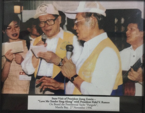  President Jiang Zemin in a sing-along with    President Fidel V. Ramos. Fr FVR Visual iconography.