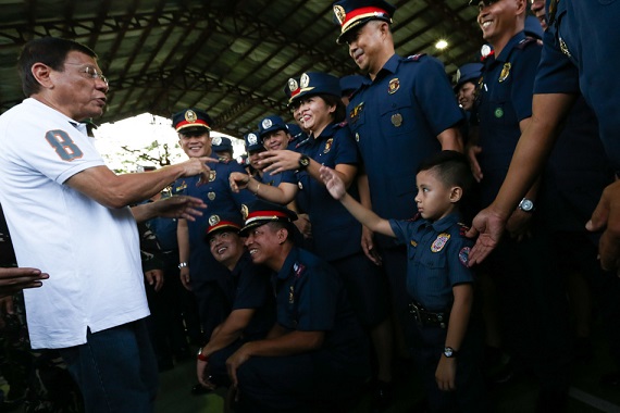 Four-year-old Allih Hachaso, son of Police Officer 3 Eric Hachaso, gives President Duterte a snappy salute duting the latter’s visit at Camp Nakar, Lucena City July 28. Photo by Toto Lozano, PPD