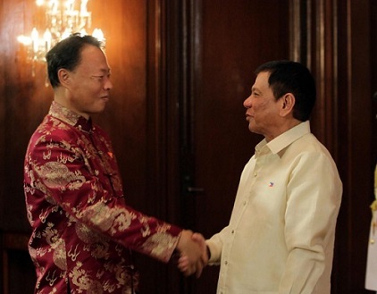 Chinese Ambassador Zhao Jianhua greets President Duterte on his inauguration as President in Malacanang, June 30.