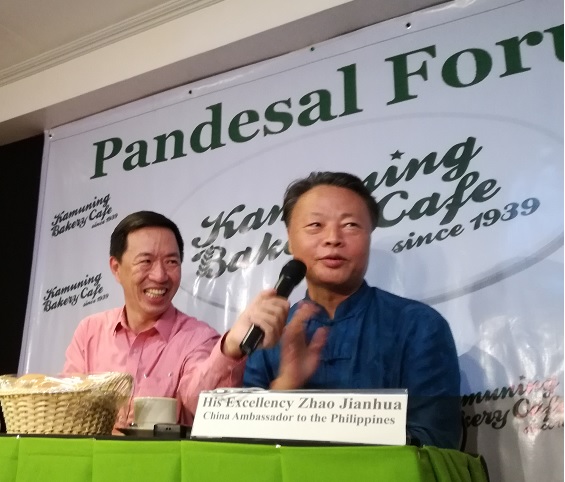 Chinese Ambassador Zhao Jianhua gives a preview of Pres. Duterte's visit to China in a press conference in Kamuning Bakery last week. Beside him is Philstar columnist Wilson Flores.