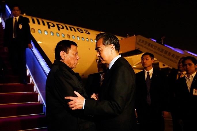 chinese-foreign-minister-wang-yi-welcomes-president-duterter-upon-his-arrival-in-beijing