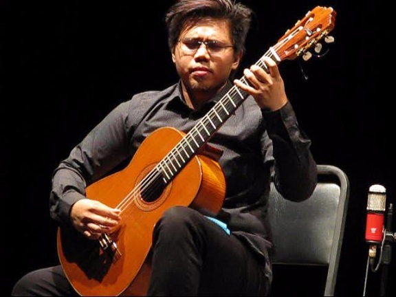 Classical guitarist Aaron Aguila III. Technique helps but better to put heart into your music.