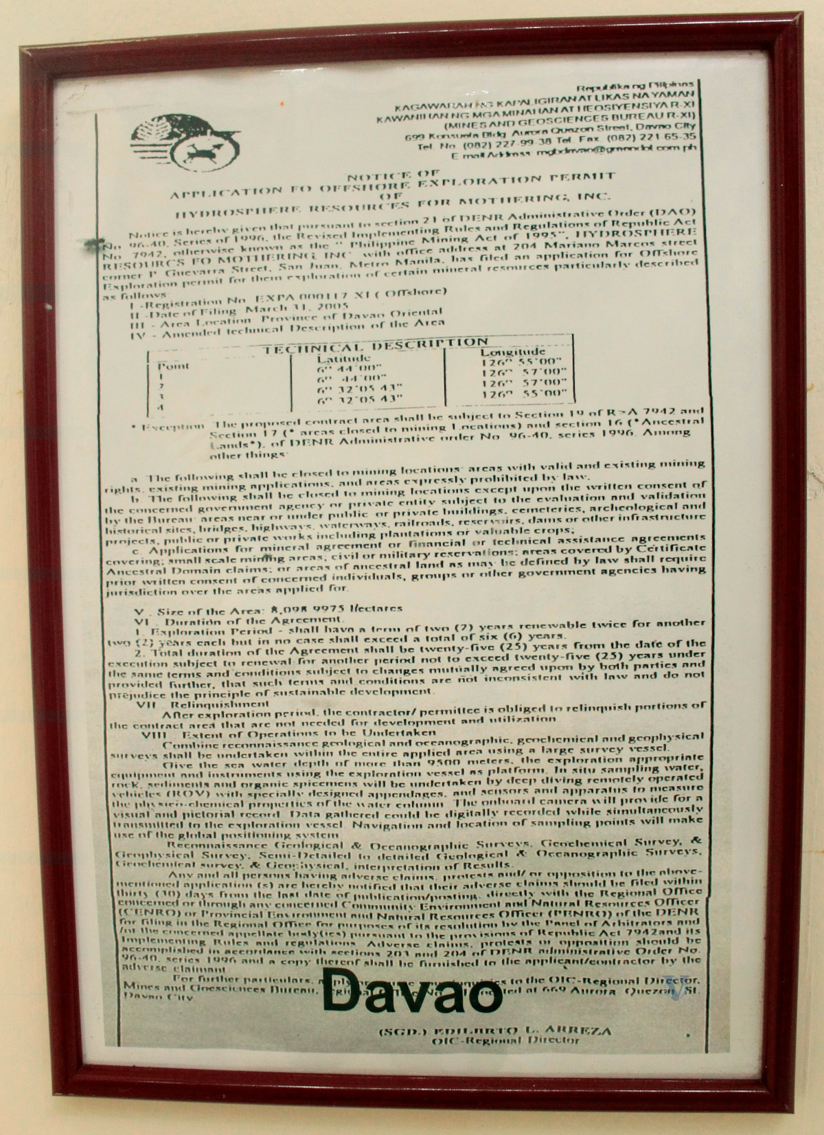 Another one of Hydrosphere Resources for Mothering, Inc.'s exploration permit applications, displayed at the Batac World Peace Center (photo by Judith Camille Rosette)