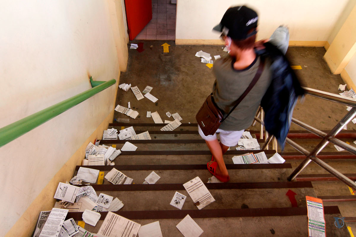 Candidate leaflets littered the stairs  at Maria Clara High School in Caloocan City. Photo by Vincent Go.