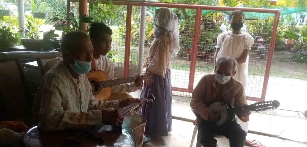 Daygon practice with Hermogenes Baldicana (right) and Ambrosio Amon (left) in Toril, Maribojoc before typhoon Odette.