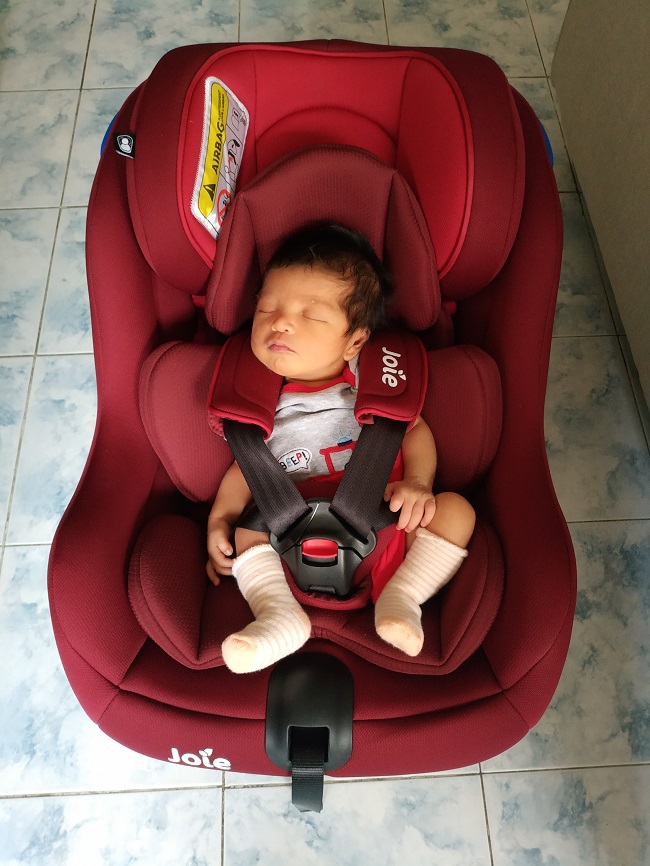 The parents of AgusVirgilio Almario did not need a law to require them to buckle him into a carseat. They always strap their baby into the safety device because they know it keepshim from being thrown against the car interior or hitting other car occupantsin the event of a road crash. (Photo: Bea Soriano Almario)
