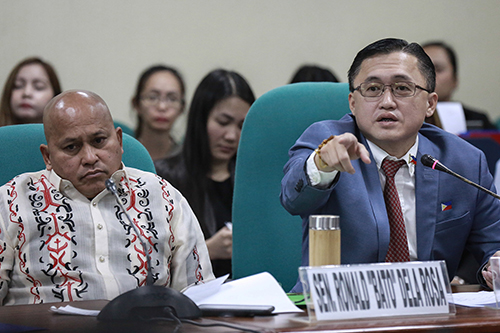 Senators Ronald “Bato” dela Rosa and Christopher Lawrence “Bong” Go during hearing by the Senate Committee on Labor, Employment and Human Resources Development on January 28, 2020. Senate photo by Alex Nueva España.