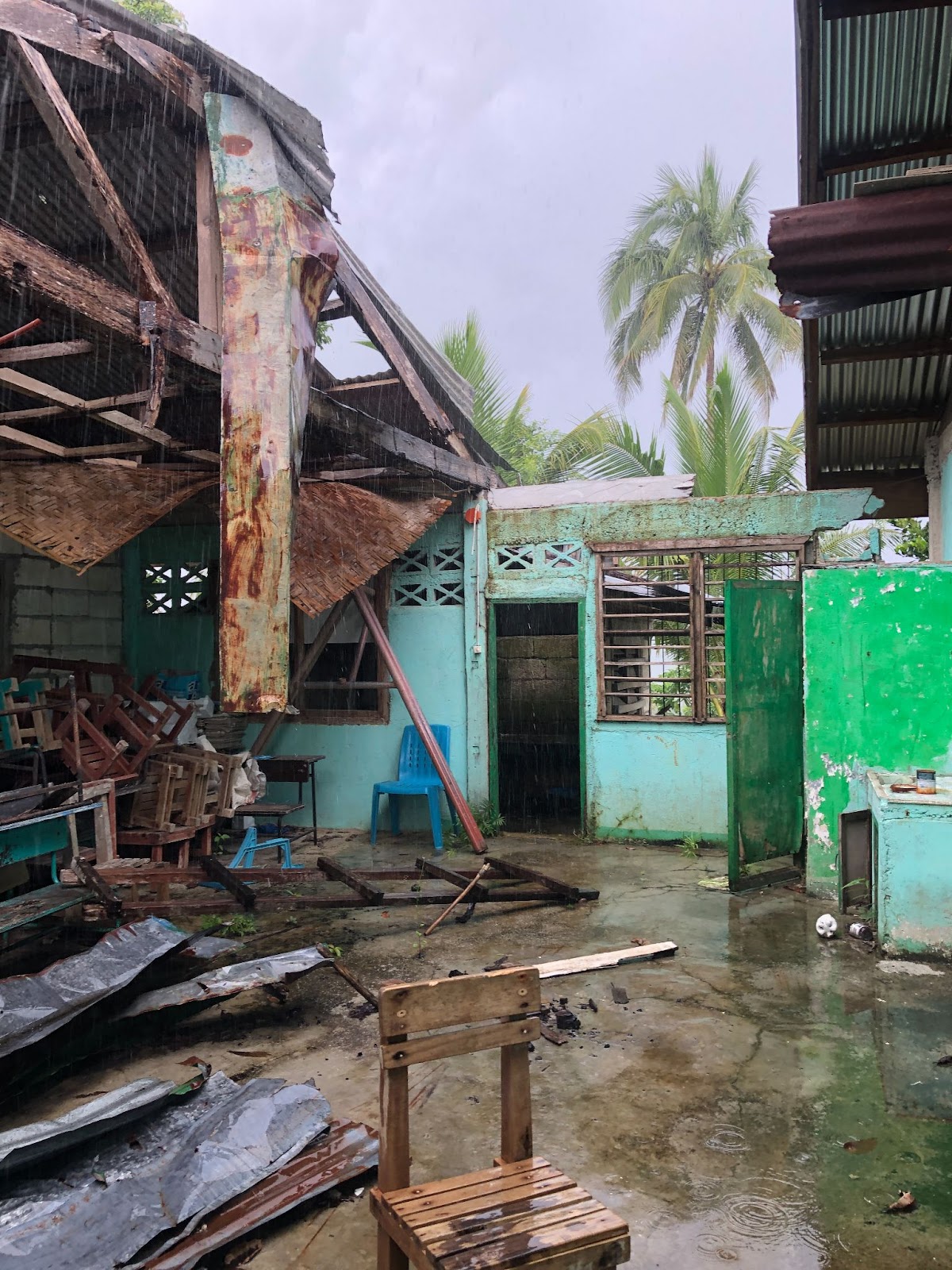 Debris from wood trusses and pieces of roof panels in Mahayag Norte Elementary School, Catigbian (Photo by: Ellyza Gamutan)