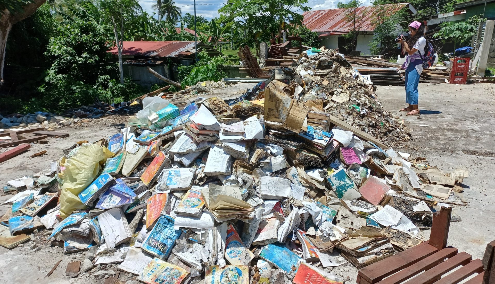 Pile of hardened books and documents in Talisay Elementary School on Cabilao Island. (Cooper Resabal)