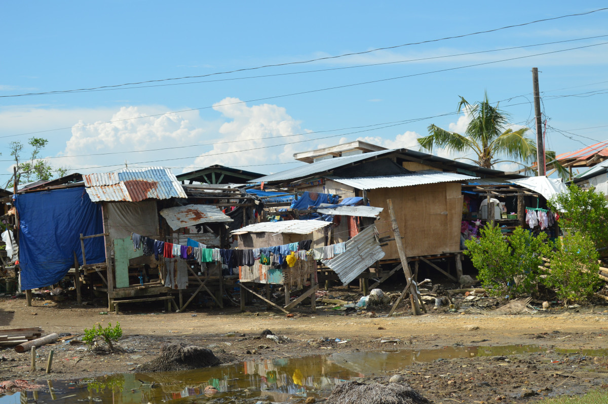Makeshift houses are back at Tinangnan, Tubigon, which was wiped out by typhoon Odette in 2021
