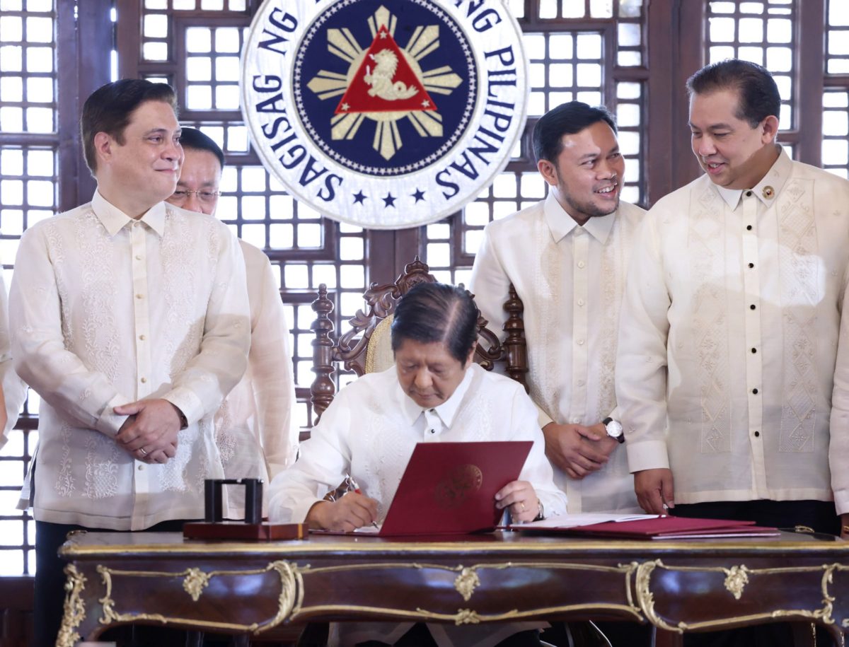 Marcos signing a bill into law. HoR photo