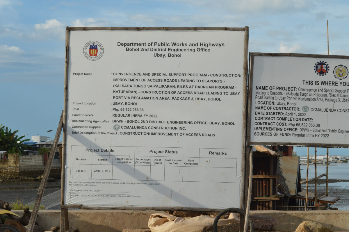 Billboard showing details of a road project in Ubay – Photo by Jephty Genoso