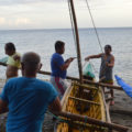 Artisanal fishers of Cantagay, Jagna, Bohol prepare their sailboat, the only one left in the area. (Cooper Resabal)