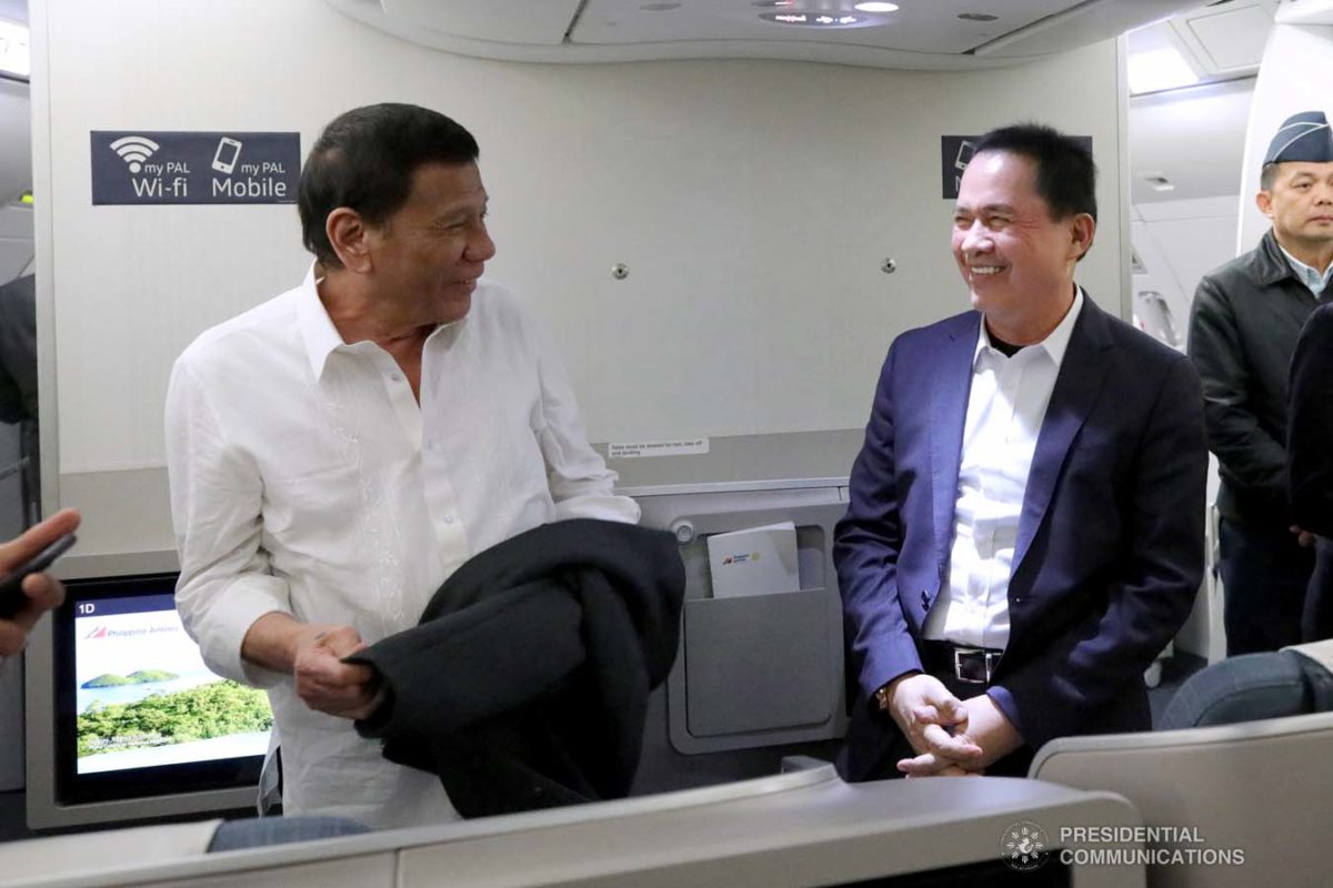 President Rodrigo Roa Duterte shares a light moment with the Kingdom of Jesus Christ, The Name Above Every Name Founder and Executive Pastor Apollo Quiboloy while on board a plane bound for Davao City on October 5, 2019. KING RODRIGUEZ/PRESIDENTIAL PHOTO