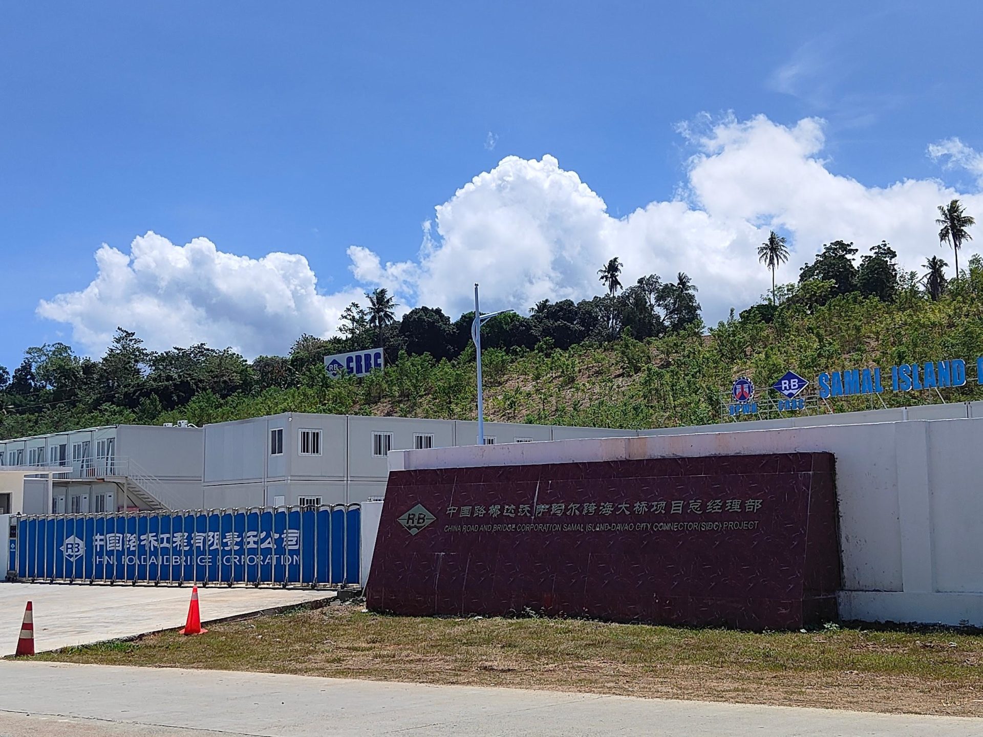 An abandoned resort serves as temporary office and barracks of the China Road and Bridge Corporation, contractor of SIDC. Photo: Lucelle Bonzo