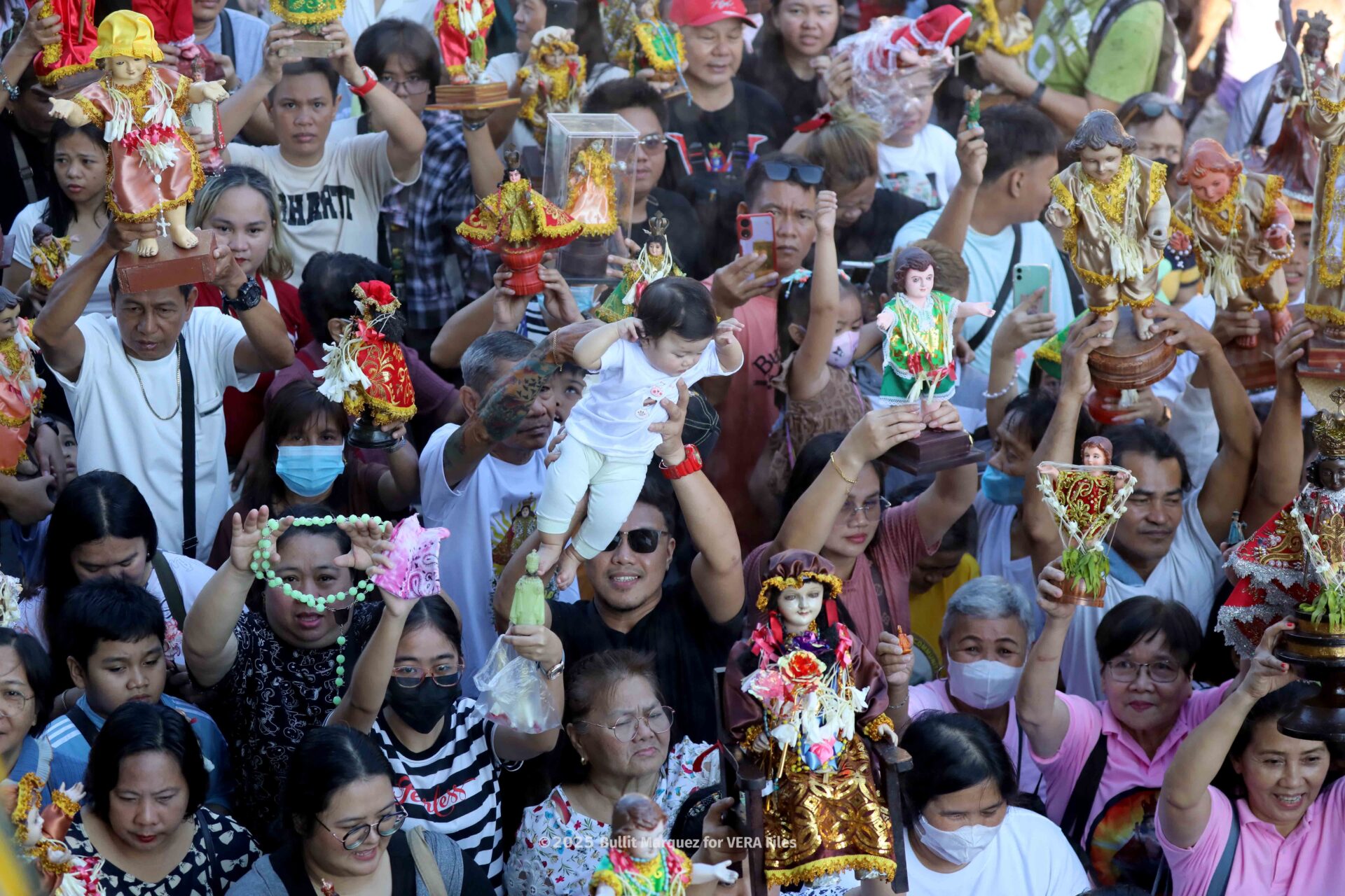 Love and devotion for the Child Jesus. Photo by Bullit Marquez 3/10