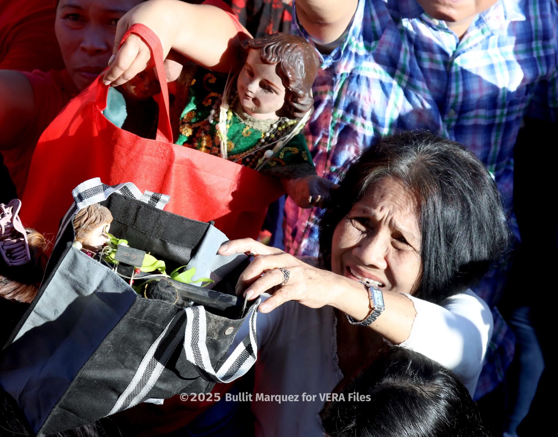 Love and devotion for the Child Jesus. Photo by Bullit Marquez 4/10