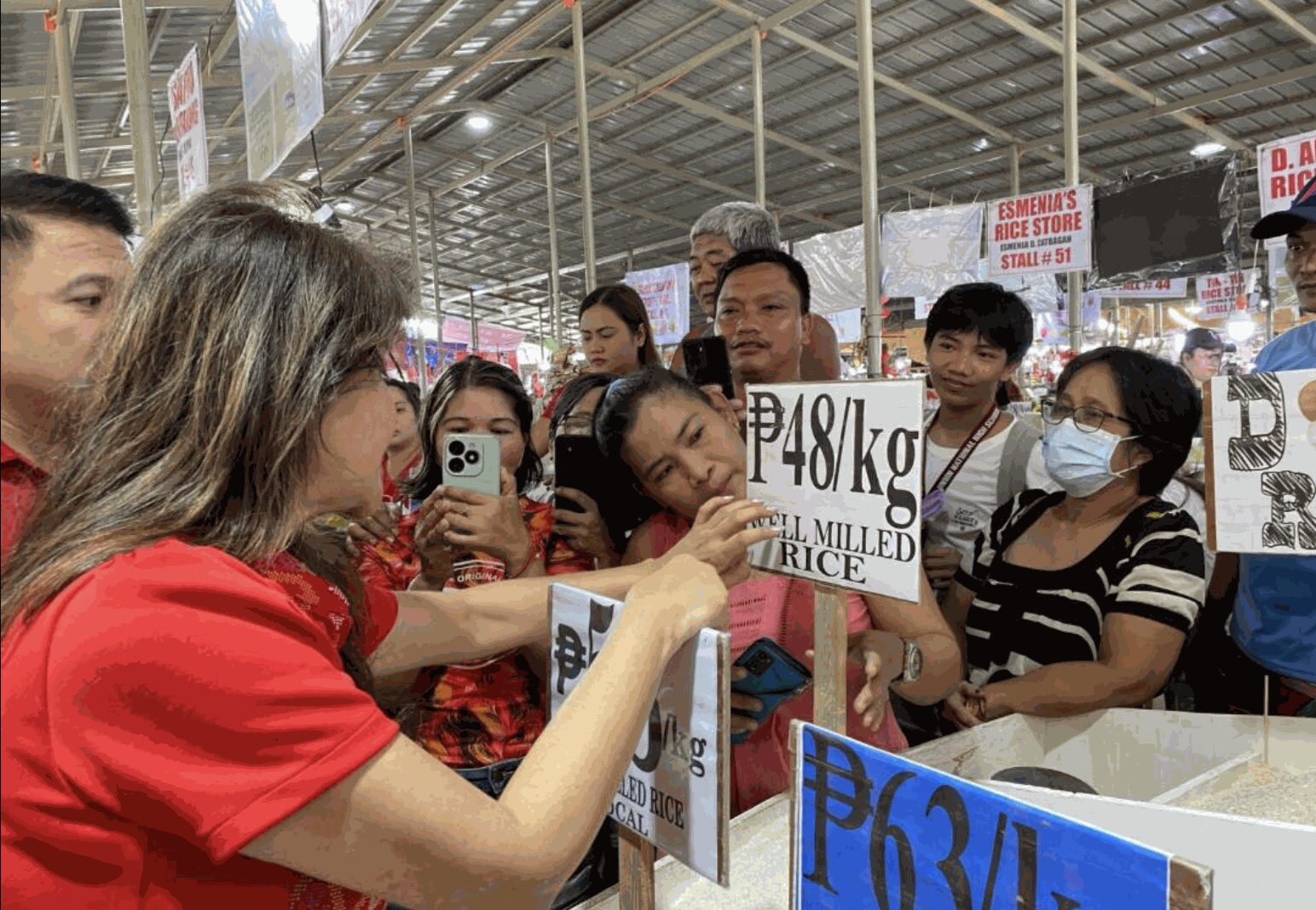 Sen. Imee Marcos checks prices of goods at a market in La Union on Feb. 14, 2025. PHOTO: Sen. Imee Marcos’ official Facebook page.