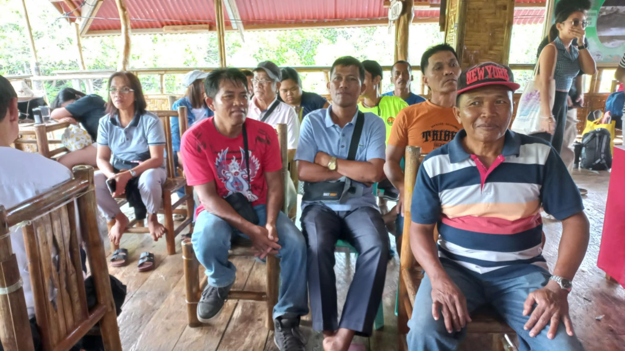 Representatives of people’s organizations gather at the BAFIAS cottage.