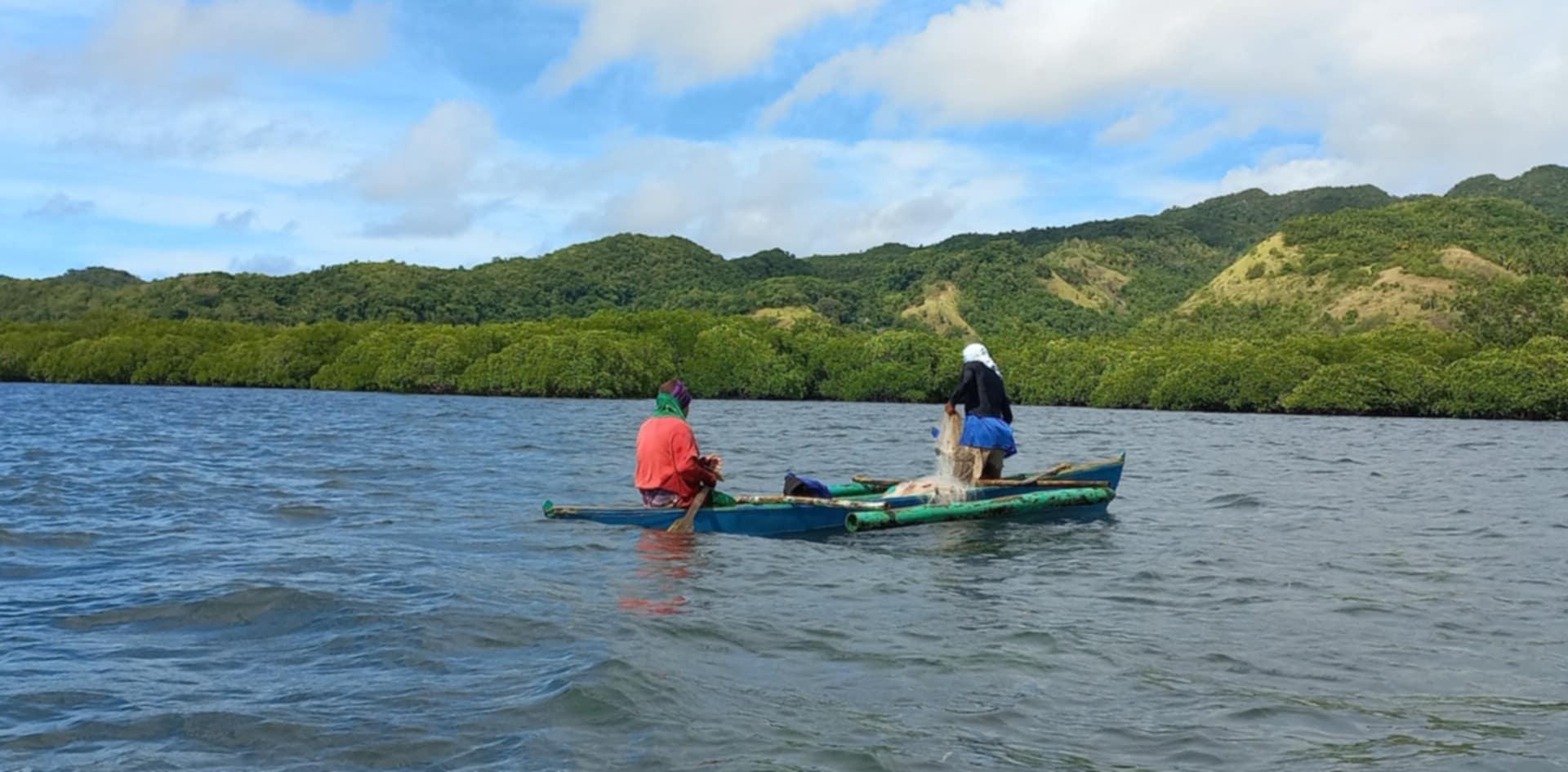 Fishermen use traditional pukot or nets to catch fish.