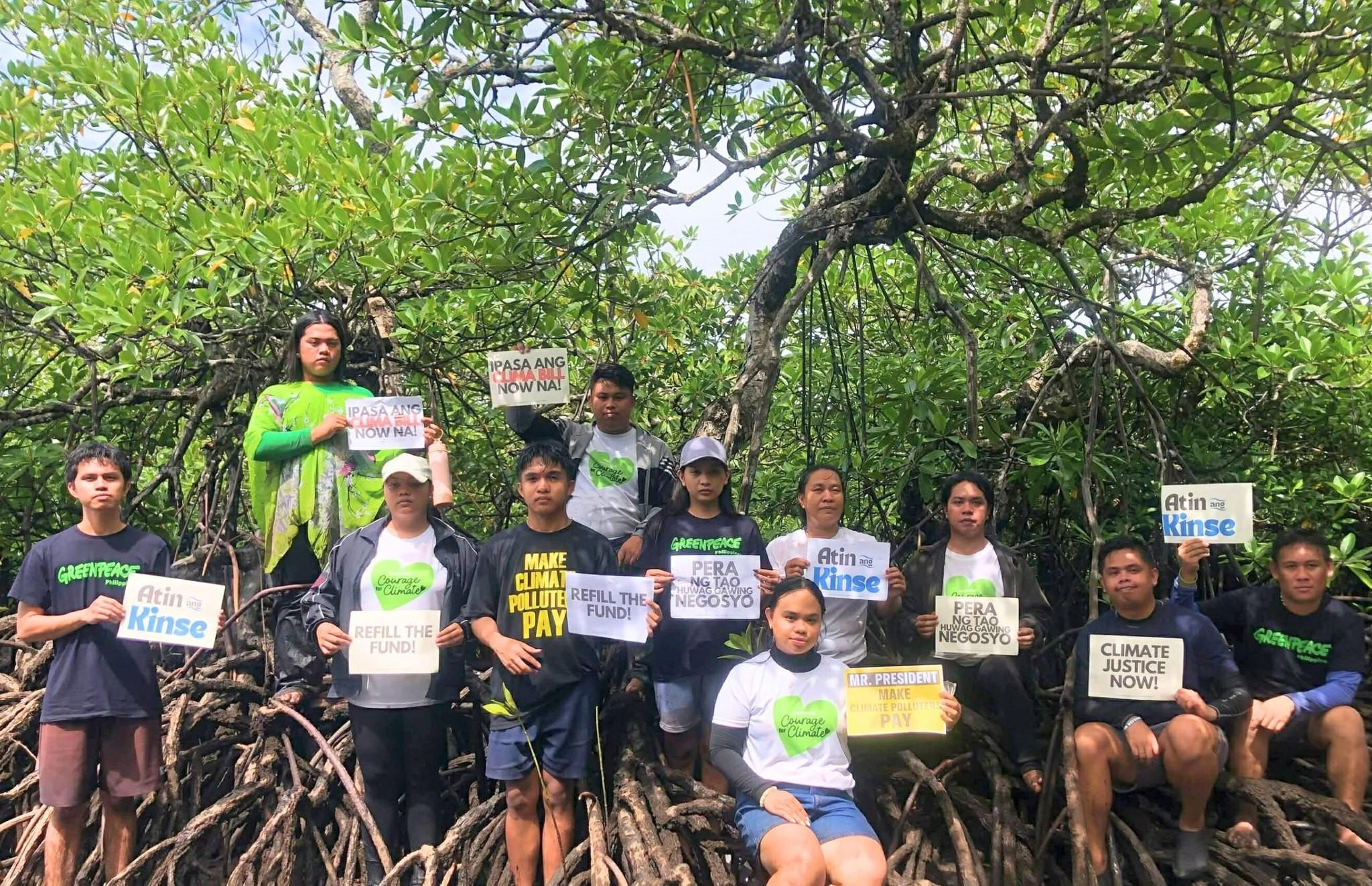 Mangrove planting. Photo by ESYCJ