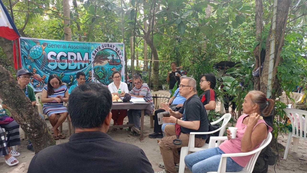 SGBM members hold a focus group discussion at Kalayukay Beach in Gubat, Sorsogon hold a focus group discussion on how the community can respond to government development projects that may affect local livelihoods and marine biodiversity. Contributed photo by SGBM