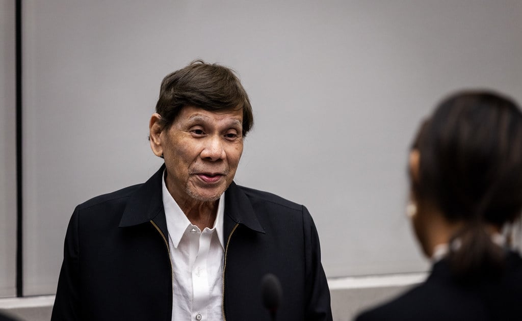 A smiling Duterte appears in person for the first time before the ICC