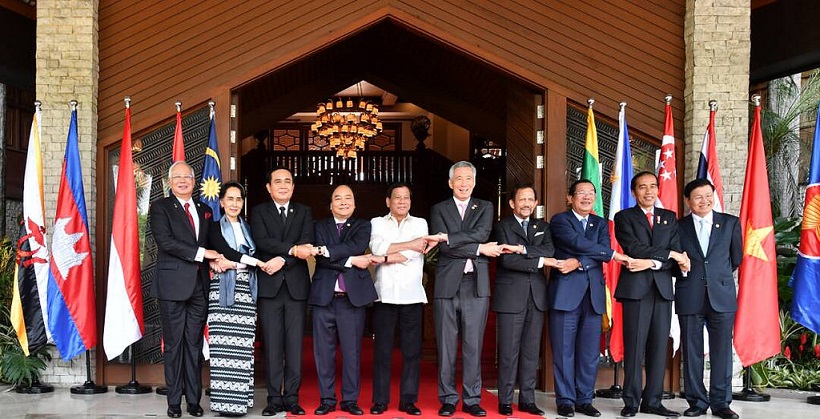 The traditional linking arms photo at  30th Asean Summit Retreat.jpg