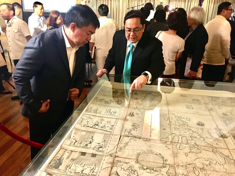 Mel Velarde explains to Senate President Aquilino Pimentel III the Murillo-Velarde map he bought in Sotheby auction in London for P12 million.jpg
