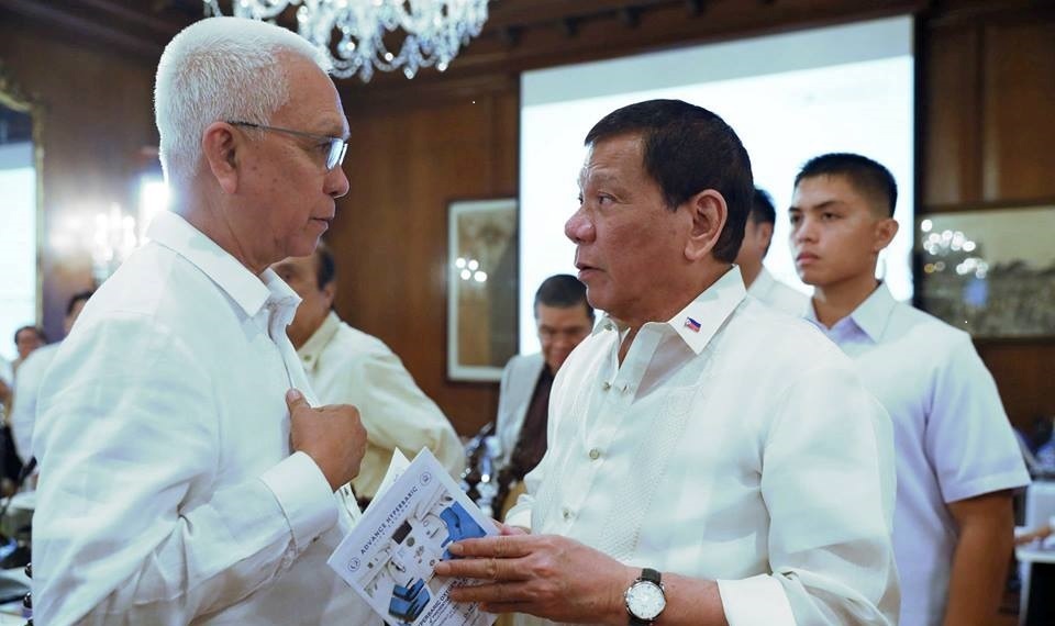 Leoncio Evasco Jr. with President Rodrigo Duterte. Photo from Bohol Chronicle..jpg